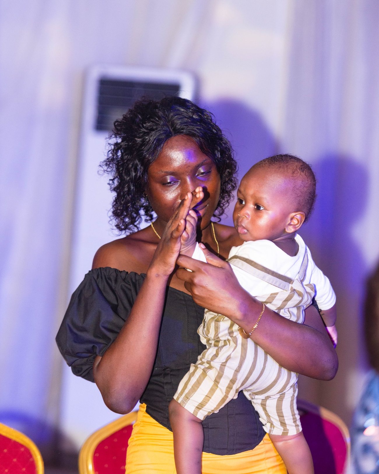 A mother and child in the Eden Life community
